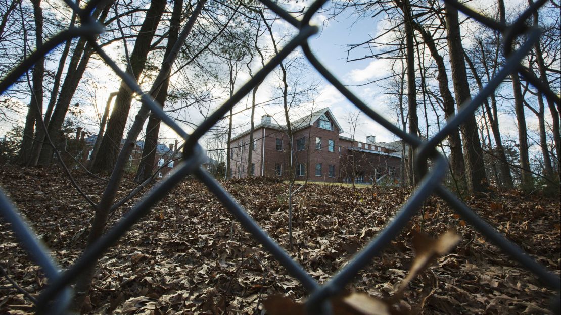 A fence encloses an estate in the village of Upper Brookville in the town of Oyster Bay, N.Y., on Long Island on Friday, Dec. 30, 2016. On Friday, the Obama administration closed this compound for Russian diplomats, in retaliation for spying and cyber-meddling in the U.S. presidential election. (AP Photo/Alexander F. Yuan)
