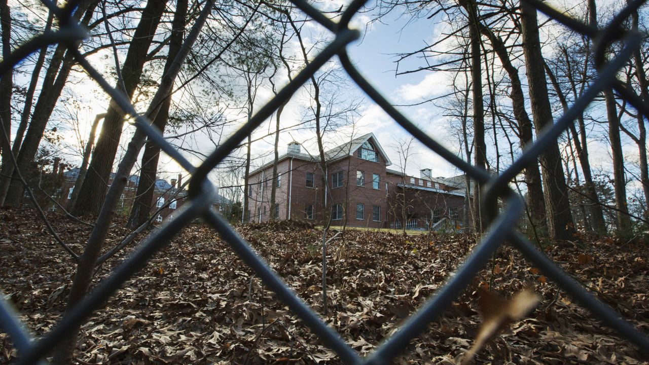 A fence encloses an estate in the village of Upper Brookville in the town of Oyster Bay, N.Y., on Long Island on Friday, Dec. 30, 2016. On Friday, the Obama administration closed this compound for Russian diplomats, in retaliation for spying and cyber-meddling in the U.S. presidential election. (AP Photo/Alexander F. Yuan)