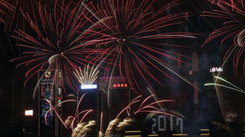 Fireworks explode over Victoria Harbour to celebrate the new year in Hong Kong.