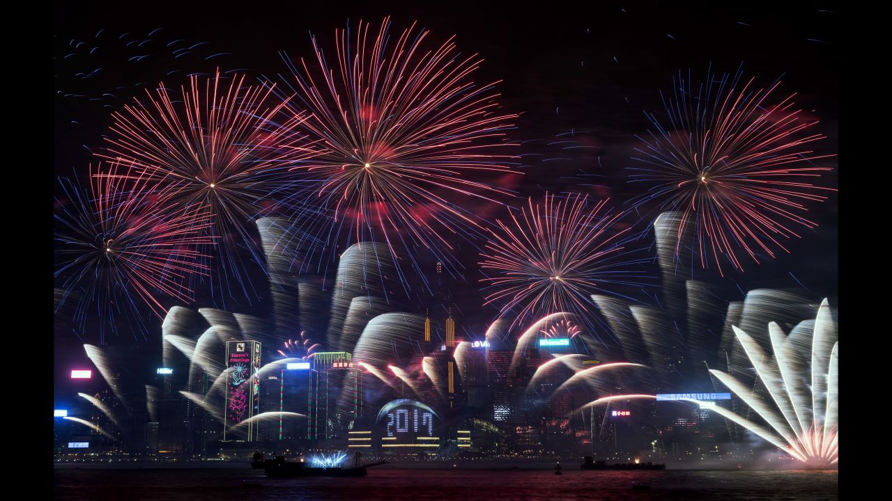 Fireworks explode over Victoria Harbor during New Year celebrations in Hong Kong on January 1, 2017