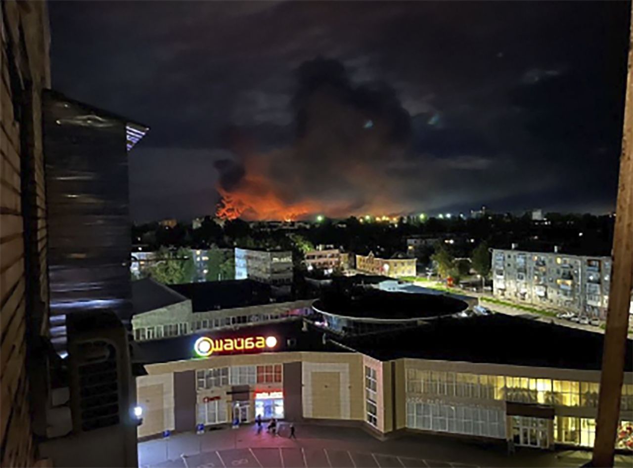 Smoke billowing over the city and a large blaze in Pskov, Russia, on August 29 after a reported drone strike.