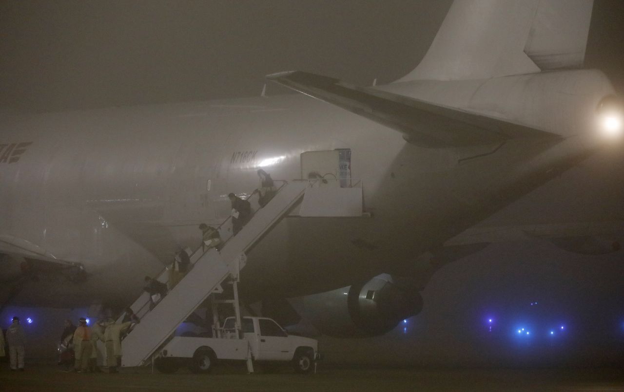 American evacuees from the Diamond Princess cruise ship arrive at Joint Base San Antonio-Lackland on February 17, 2020 in San Antonio, Texas.