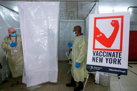 Health workers prepare to administer Covid-19 vaccines at a vaccination site in Harlem, New York, on January 15.