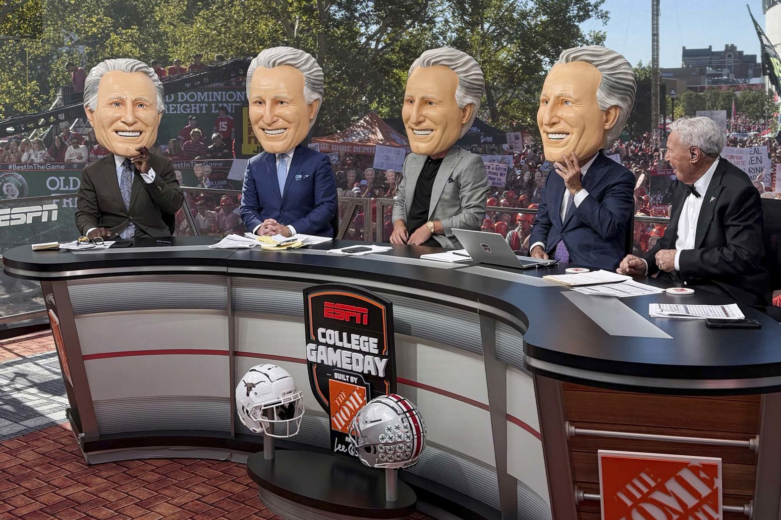 ESPN’s Lee Corso, right, react to his “College GameDay” colleagues wearing Corso heads in Columbus, Ohio, on Saturday, August 30. It was the final “GameDay” for Corso, <a href="index.php?page=&url=https%3A%2F%2Fwww.cnn.com%2F2025%2F08%2F30%2Fsport%2Ffootball-ncaa-lee-corso-retirement-profile-intl">who is retiring at the age of 90</a>.