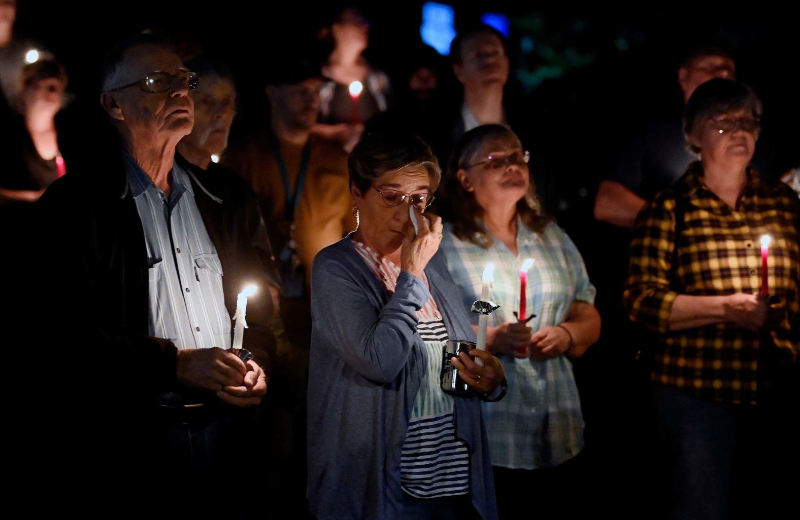 Diana Hicks wipes away tears Saturday, October 11, as she attends a candlelight vigil in Nunnelly, Tennessee, for the 16 people who were killed in a <a href="index.php?page=&url=https%3A%2F%2Fwww.cnn.com%2F2025%2F10%2F15%2Fus%2Ftennessee-explosion-victims-id-rapid-dna">devastating blast</a> at a facility that specialized in making military explosives. The cause of the explosion is under investigation.