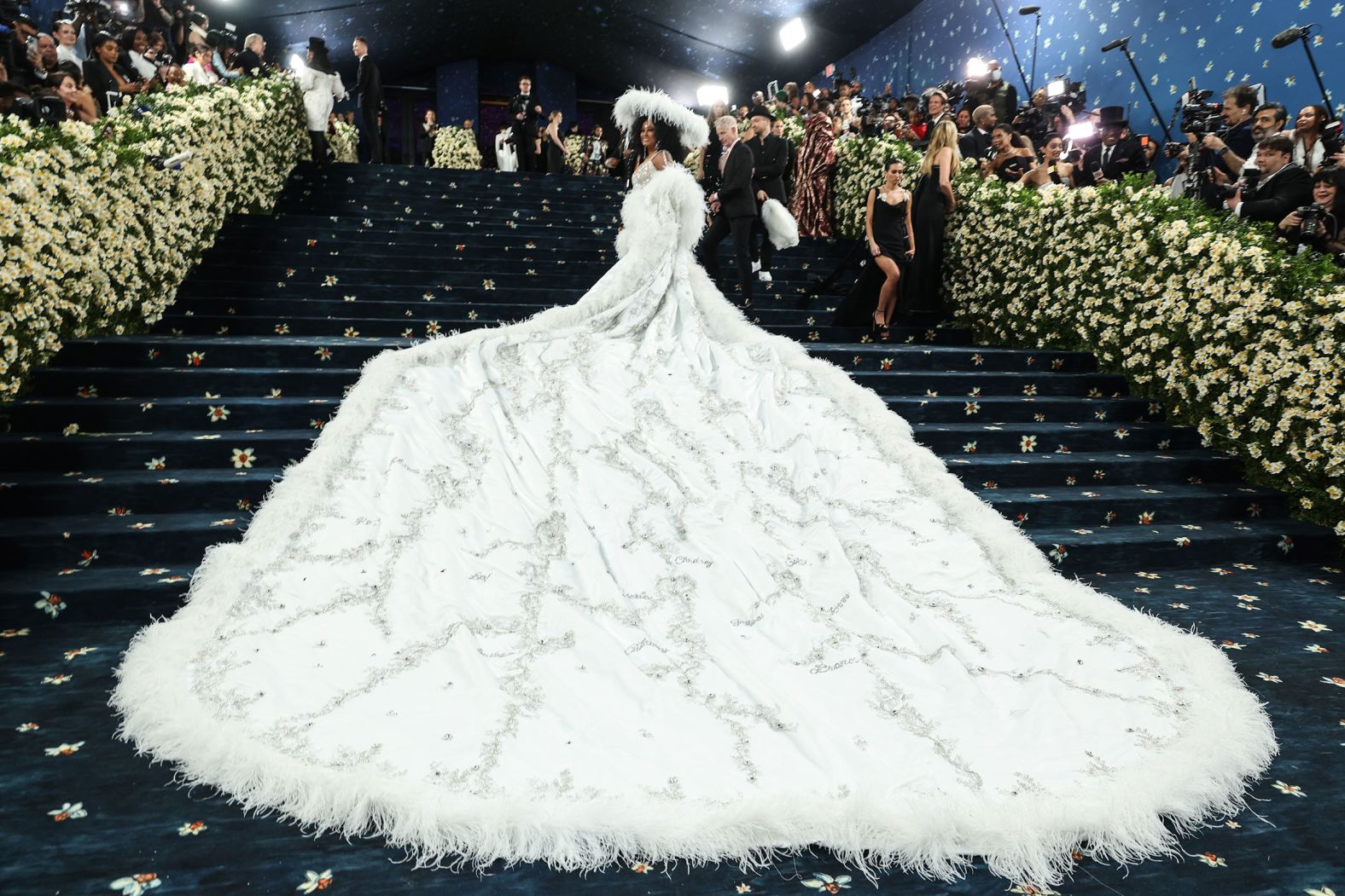 Iconic singer Diana Ross attends the annual Met Gala in New York on Monday, May 5. Her 60-pound, 18-foot-long train was embroidered with the names of all of her children and grandchildren. <a href="index.php?page=&url=https%3A%2F%2Fwww.cnn.com%2F2025%2F05%2F05%2Fstyle%2Fmet-gala-2025-red-carpet-fashion">See all the best looks from the Met Gala</a>.