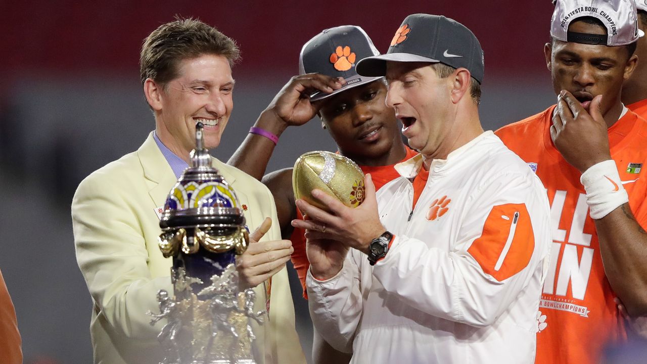 GLENDALE, AZ - DECEMBER 31:  Head coach Dabo Swinney of the Clemson Tigers holds the Fiesta Bowl trophy after the Clemson Tigers beat the Ohio State Buckeyes 31-0 to win the 2016 PlayStation Fiesta Bowl at University of Phoenix Stadium on December 31, 2016 in Glendale, Arizona.  (Photo by Jamie Squire/Getty Images)