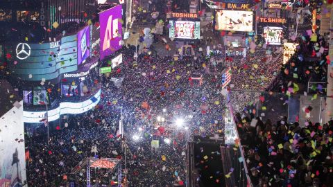 People celebrate 2017 as confetti flies over Times Square in New York City on Sunday, January 1.