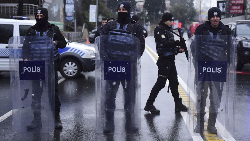 Turkish police officers stand guard close to the site of an armed attack near the Reina night club, one of the Istanbul's most exclusive party spots, early on January 1, 2017 after at least one gunmen went on a shooting rampage during New Year's Eve celebrations.
Thirty-nine people, including many foreigners, were killed when a gunman reportedly dressed as Santa Claus stormed an Istanbul nightclub as revellers were celebrating the New Year, the latest carnage to rock Turkey after a bloody 2016. / AFP / YASIN AKGUL        (Photo credit should read YASIN AKGUL/AFP/Getty Images)