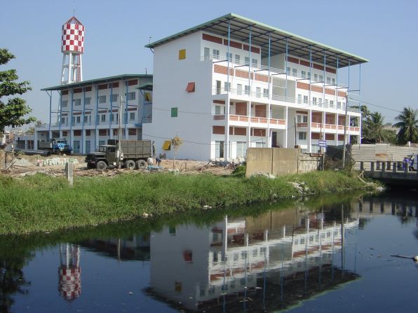 This community housing project in Ho Chi Minh City provides naturally ventilated rooms and and sun protection to help residents save money on energy costs. 