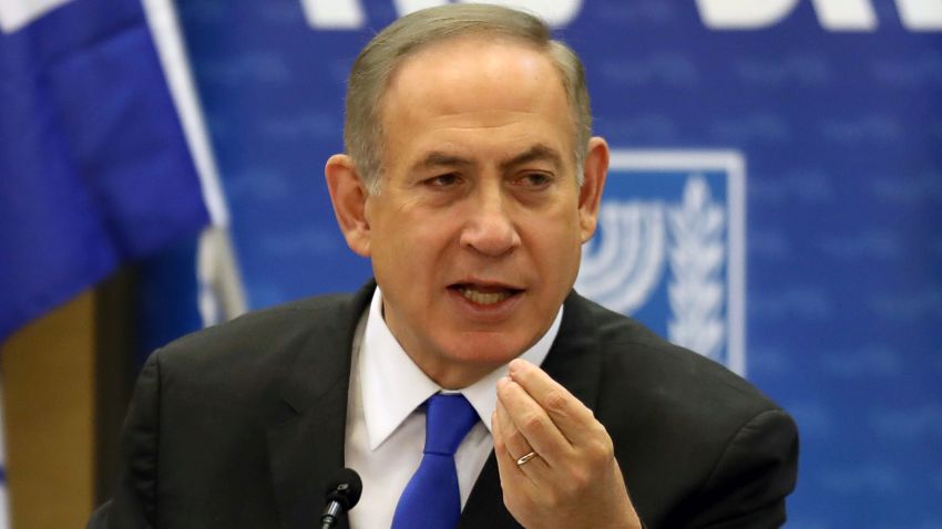 Israeli Prime Minister Benjamin Netanyahu gestures as he speaks during a Likud faction meeting at the Knesset (Israel's Parliament) in Jerusalem on  January 2, 2017.
Netanyahu denied any wrongdoing ahead of his expected questioning by police in a graft probe, telling his political opponents to put any "celebrations" on hold. / AFP / GALI TIBBON        (Photo credit should read GALI TIBBON/AFP/Getty Images)