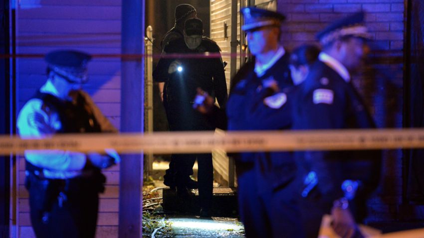 Police investigate a multiple homicide scene a 8048 S. South Shore Dr. that left 3 dead and 1 wounded Wednesday, Nov. 3, 2016 in Chicago. (Brian Jackson/Chicago Tribune/TNS via Getty Images)