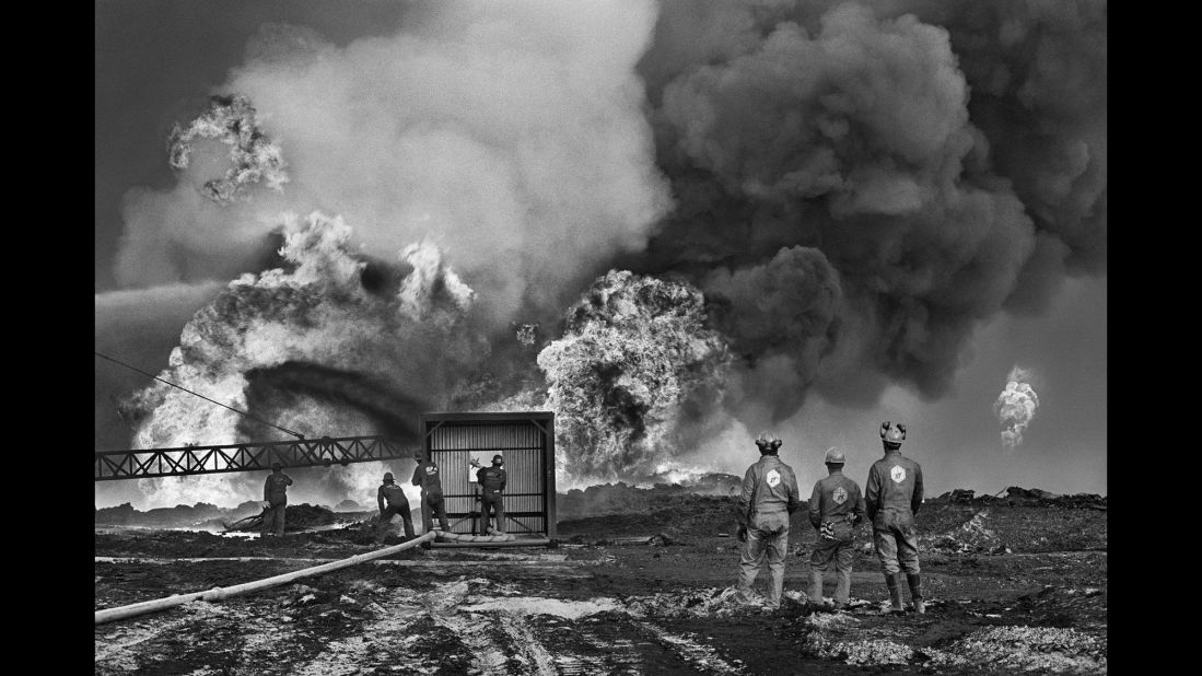 Oil workers battle a fire in Kuwait in 1991. It took nearly an entire year to cap the oil wells that were set on fire by Saddam Hussein's forces during the Gulf War.
