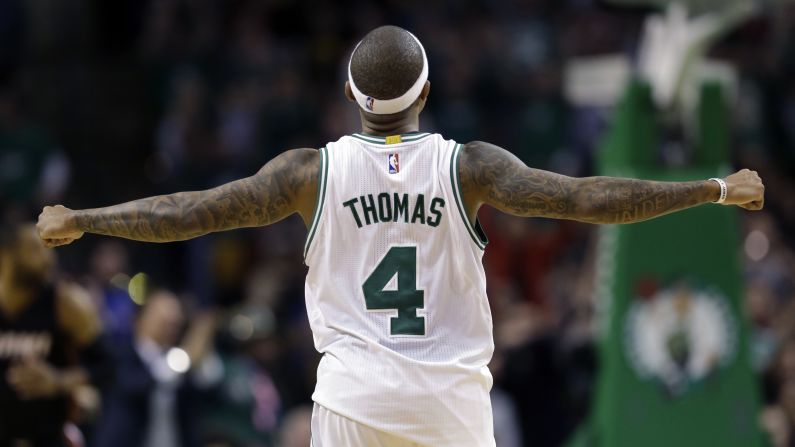 Boston guard Isaiah Thomas celebrates during a home win against Miami on Friday, December 30. He scored a career-high 52 points in the Celtics' victory.