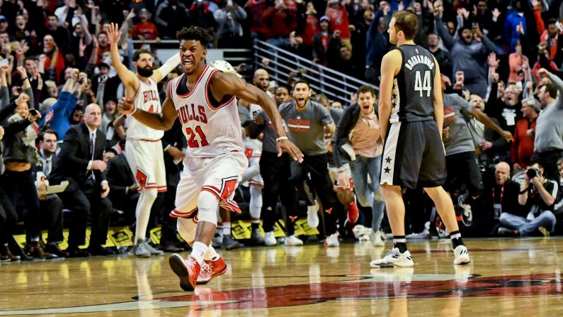 Chicago's Jimmy Butler (No. 21) reacts after scoring the game-winning basket against Brooklyn on Wednesday, December 28. Butler had 40 points in the 101-99 victory.