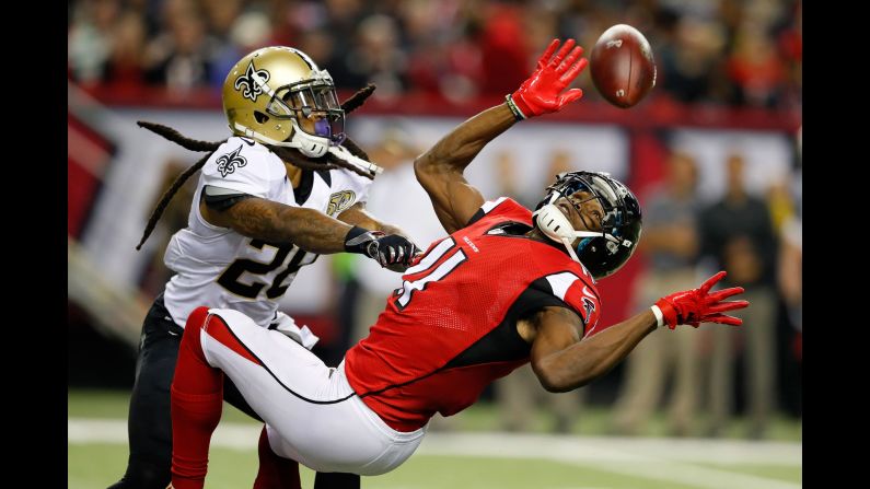 New Orleans cornerback B.W. Webb, left, breaks up a pass intended for Atlanta's Julio Jones during an NFL game in Atlanta on Sunday, January 1. Atlanta won 38-32 to clinch a first-round bye in the playoffs.