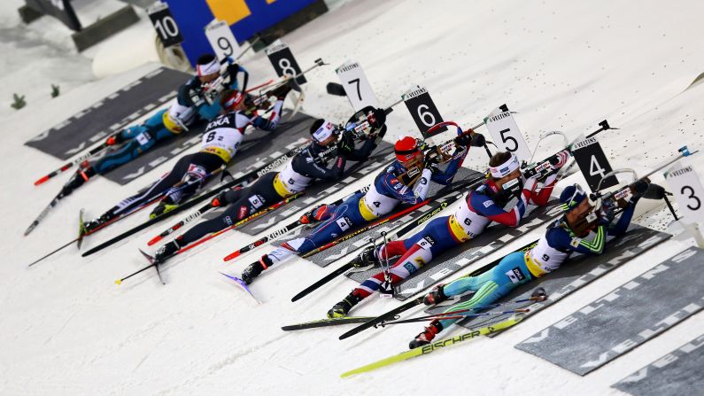 Biathletes shoot during a team event in Gelsenkirchen, Germany, on Wednesday, December 28.