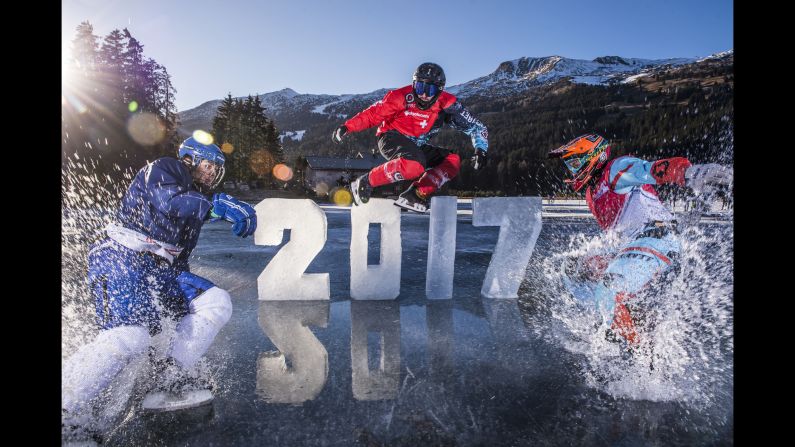 Athletes who compete in downhill ice cross -- specifically the Red Bull Crashed Ice series -- skate on black ice in Lenzerheide, Switzerland, on Friday, December 30. The photo shoot was held on Lake Heid, which had a clear-glass look because there hadn't been any snow. <a href="index.php?page=&url=http%3A%2F%2Fwww.cnn.com%2F2016%2F12%2F26%2Fsport%2Fgallery%2Fwhat-a-shot-sports-1227%2Findex.html" target="_blank">See 32 amazing sports photos from last week</a>