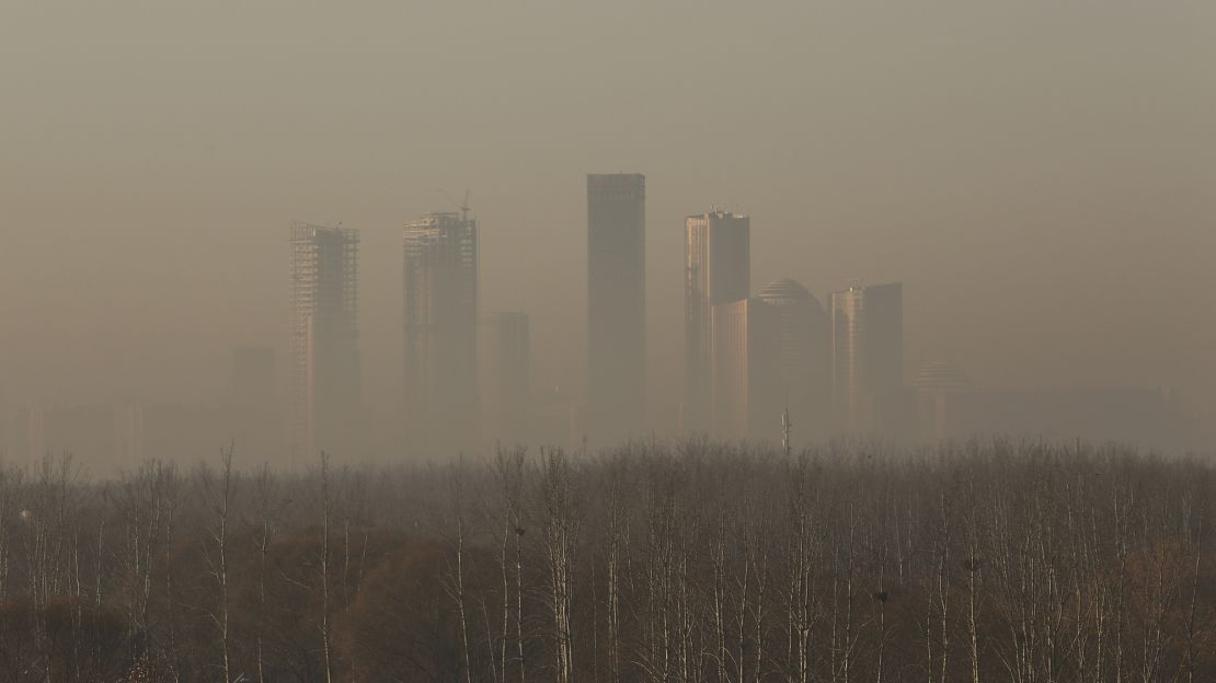Beijing's cental business district was clouded in pollution December 31 during an orange alert -- not as bad as what came in the new year.