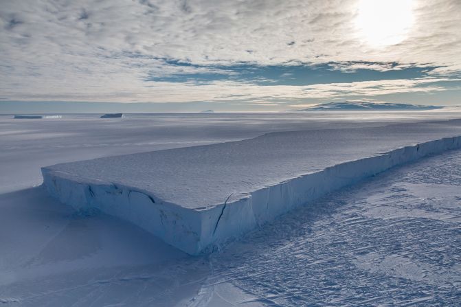 <strong>Icebergs: </strong>Icebergs are pieces of freshwater ice that break away from a glacier or ice shelf. While often seen by cruise ship travelers further north of McMurdo Sound, the pictured icebergs are grounded and held in by the sea ice. This one is four miles long and has been in the same spot for years.