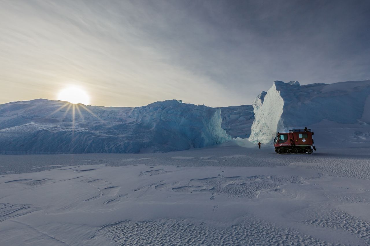 <strong>Logistics:</strong> United States Antarctic Program researchers and support staffers use different types of tracked vehicles to safely travel along the sea ice. A PistenBully is used to assess sea ice routes for safe travel.