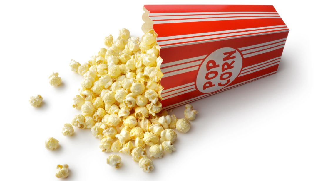 Air-popped popcorn is a healthy, whole-grain, antioxidant-rich snack that's low in calories. But movie theater popcorn, which is popped in coconut oil, is a diet disaster, contributing 1,200 calories and about three days worth of saturated fat for a medium bucket -- and that's without the buttery topping.