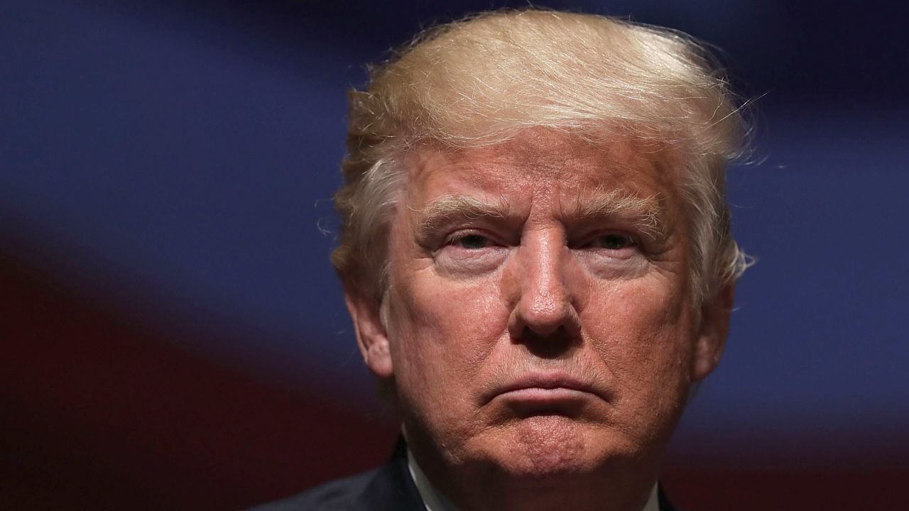 VIRGINIA BEACH, VA - SEPTEMBER 06:  Republican presidential nominee Donald Trump pauses during a campaign event September 6, 2016 in Virginia Beach, Virginia. Trump participated in a discussion with retired Army Lieutenant General Michael Flynn.  (Photo by Alex Wong/Getty Images)