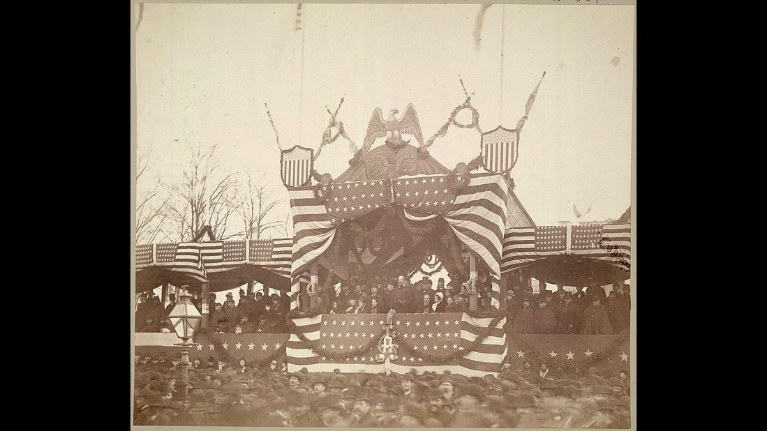 President James A. Garfield views the inauguration ceremonies in 1881. He was the first to watch the parade from a stand built in front of White House.