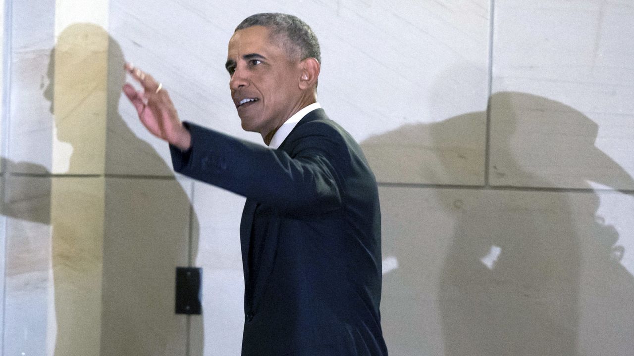 President Barack Obama arrives for a meeting with the House and Senate Democratic caucuses to discuss the Affordable Care Act at the US Capitol on January 4, 2017. 