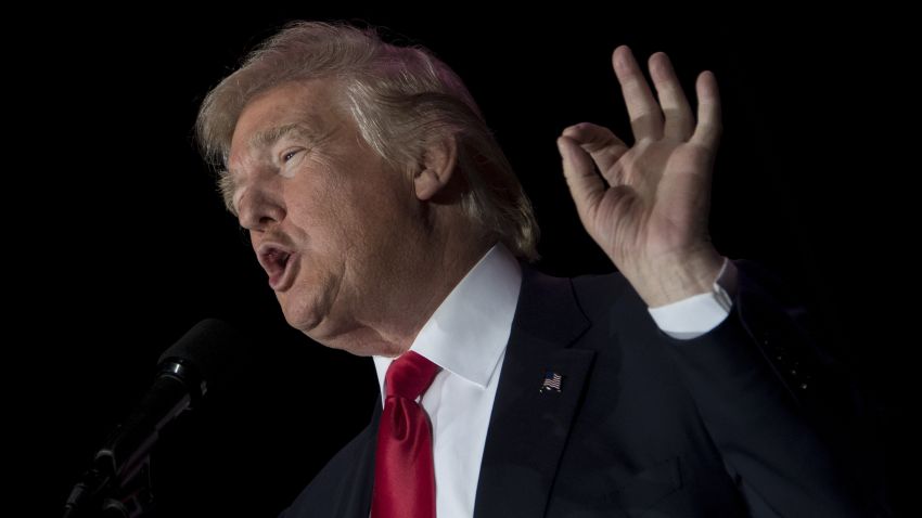 US President-elect Donald Trump speaks during a 'Thank You Tour 2016' rally in Orlando, Florida on December 16, 2016. / AFP / JIM WATSON        (Photo credit should read JIM WATSON/AFP/Getty Images)