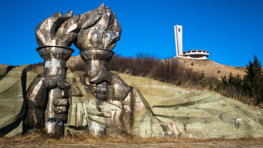 <strong>Iron Fists: </strong>Officially known as the House-Monument of the Bulgarian Communist Party, it lies on top of Mount Buzludzha. The peak's top was leveled by dynamite so that the foundations could be built. At the bottom of the hill two iron fists hold flaming torches. 