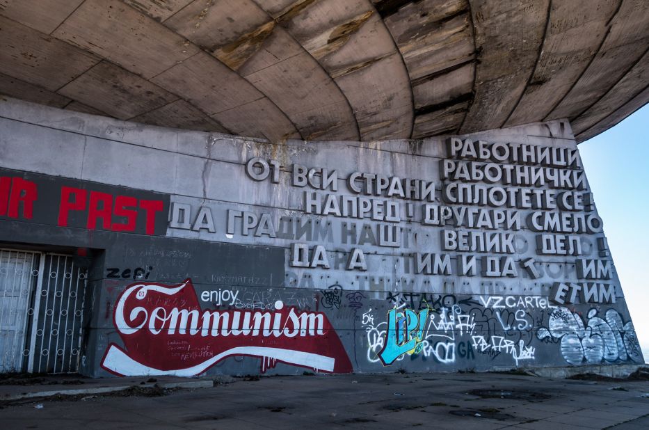 <strong>'Enjoy Communism': </strong>The original Cyrillic letters are crumbling, but new slogans are being added all the time.