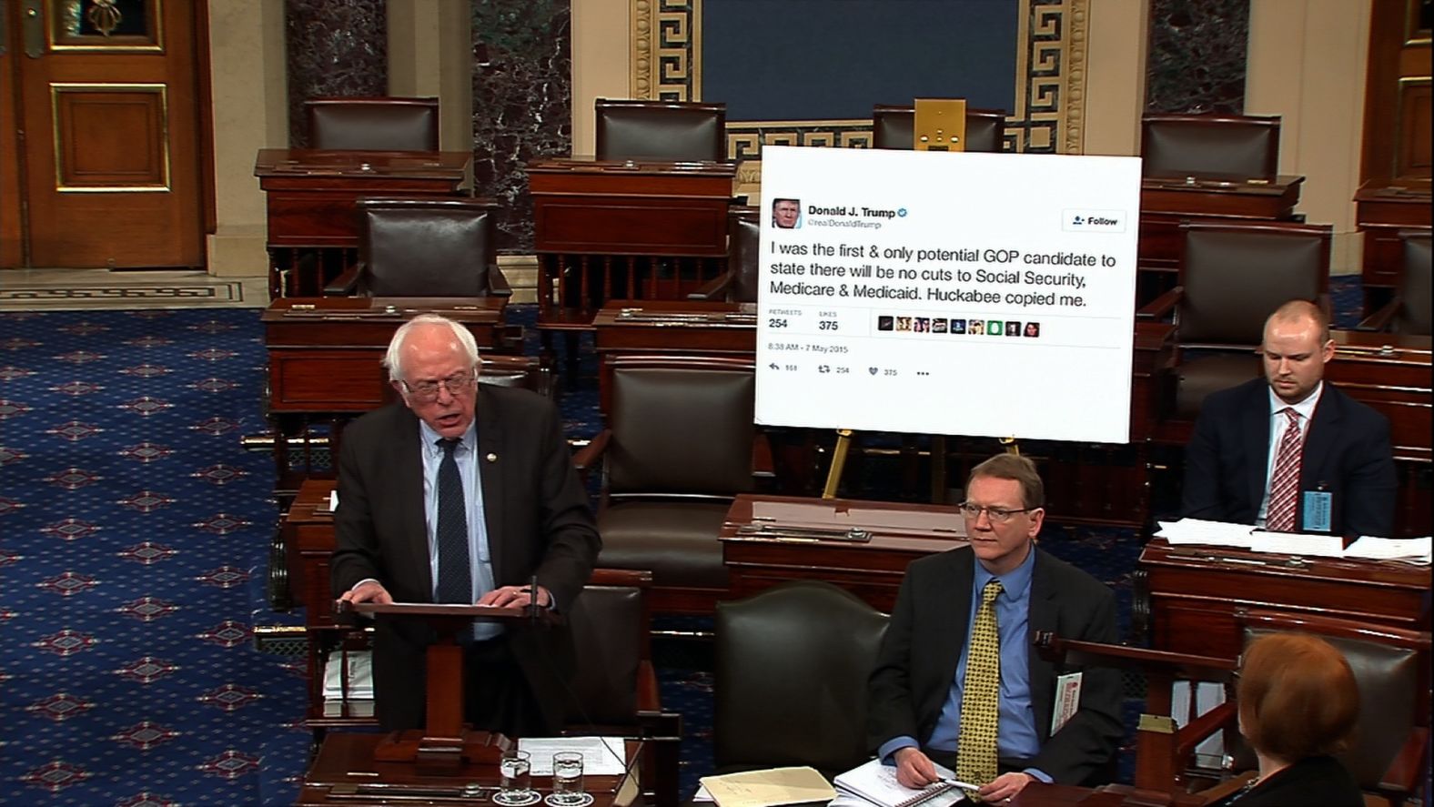 Sanders <a  target="_blank">brings a giant printout of one of Donald Trump's tweets</a> to a Senate debate in January 2017. In the tweet, Trump had promised not to cut Social Security, Medicare and Medicaid.