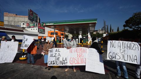 Demonstrators protest against the rise in fuel prices at a petrol station in Mexico City on Thursday.