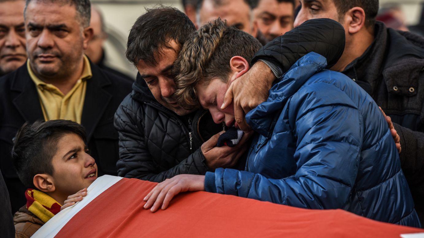 Relatives of Ayhan Arik, one of the victims of a nightclub shooting in Istanbul, cry during his funeral ceremony on Sunday, January 1. The popular Reina nightclub <a href="http://www.cnn.com/2016/12/31/world/gallery/istanbul-turkey-nightclub-attack/index.html" target="_blank">was attacked shortly after midnight</a> on New Year's Day. At least 39 people were killed. Authorities are still searching for the gunman.