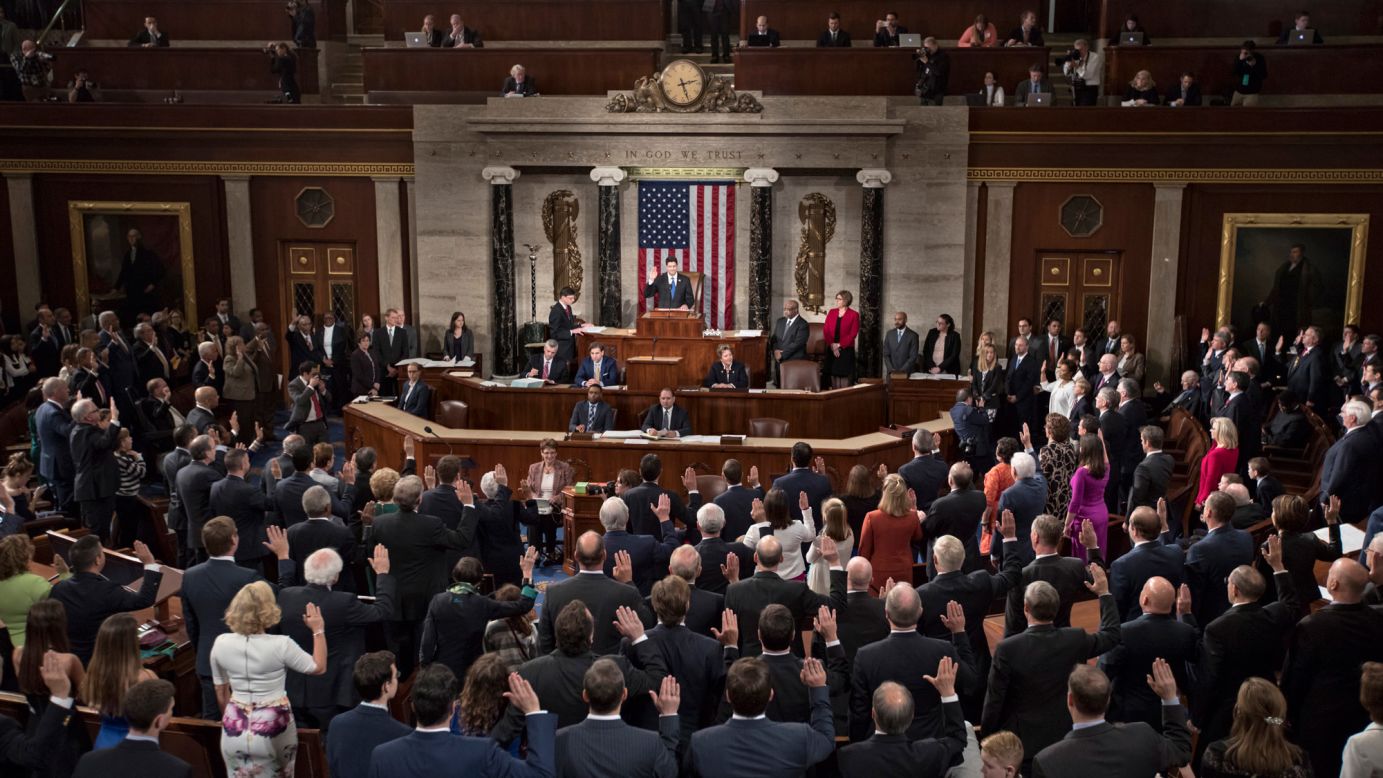 House Speaker Paul Ryan swears in members of the House as the 115th Congress convenes in Washington on Tuesday, January 3.