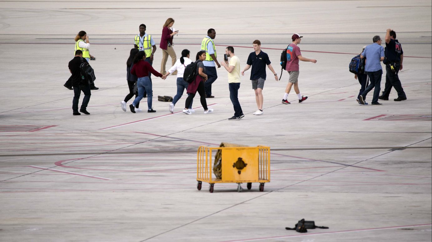 Officials said it's too early in the investigation to know for certain what prompted a man to open fire on people at the baggage claim area in Terminal 2.