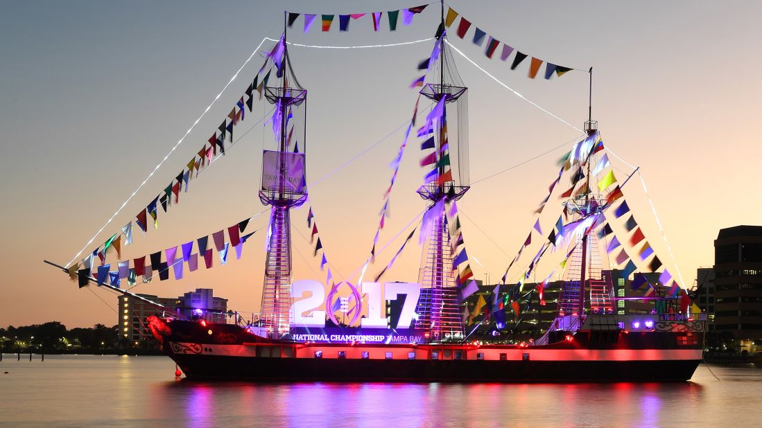 The Alabama Crimson Tide and Clemson Tigers are vying for the College Football Playoff National Championship on Monday, January 9, in Tampa, Florida. Here, the "pirate" ship Jose Gasparilla celebrates the playoff game with an illuminated sign in Hillsborough Bay near downtown Tampa. Check out some highlights from the two teams' earlier games: