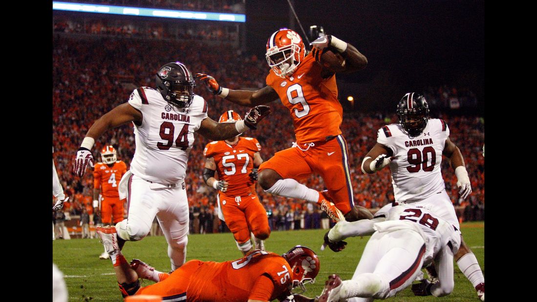 Clemson running back Wayne Gallman leaps into the end zone for a touchdown during a November 26 game against the South Carolina Gamecocks in Clemson.