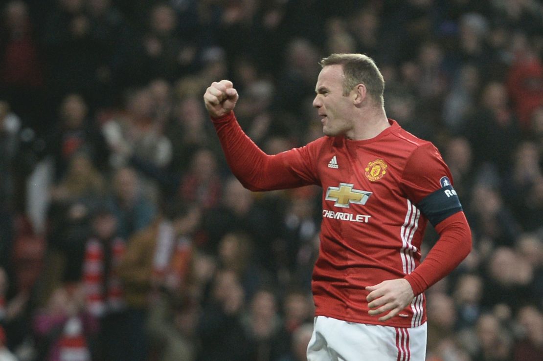 Manchester United's Wayne Rooney celebrates scoring the opening goal against Reading to equal the club record of 249 goals set by Bobby Charlton.