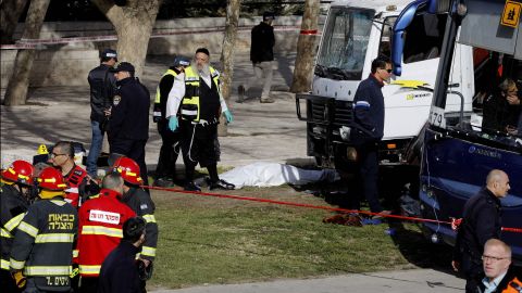 The white truck at right was the one used in the attack.