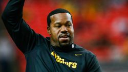 Joey Porter, a Pittsburgh Steelers assistant coach and former player, walks on the field prior to the game against the Atlanta Falcons at the Georgia Dome on December 14, 2014 in Atlanta, Georgia.