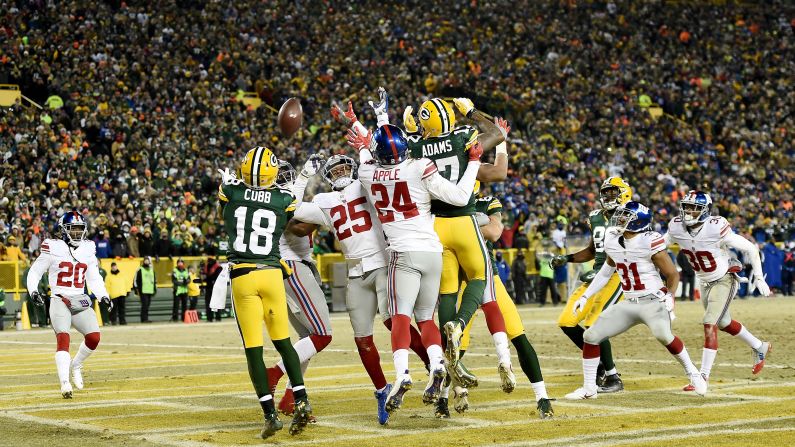 Green Bay wide receiver Randall Cobb <a href="index.php?page=&url=http%3A%2F%2Fbleacherreport.com%2Farticles%2F2685925-aaron-rodgers-hits-randall-cobb-on-hail-mary-td-throw-to-end-the-half" target="_blank" target="_blank">catches a "Hail Mary" pass for a touchdown</a> during an NFL playoff game against the New York Giants on Sunday, January 8. The play came at the end of the first half and gave the Packers a 14-6 lead. Cobb had three touchdowns in the game as Green Bay won 38-13.
