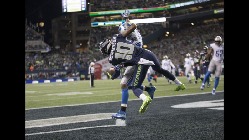 Seattle wide receiver Paul Richardson <a href="index.php?page=&url=http%3A%2F%2Fbleacherreport.com%2Farticles%2F2685822-paul-richardson-makes-insane-1-handed-catch-vs-lions" target="_blank" target="_blank">makes a spectacular one-handed touchdown catch</a> during an NFL playoff game against Detroit on Saturday, January 7. Seattle won 26-6.