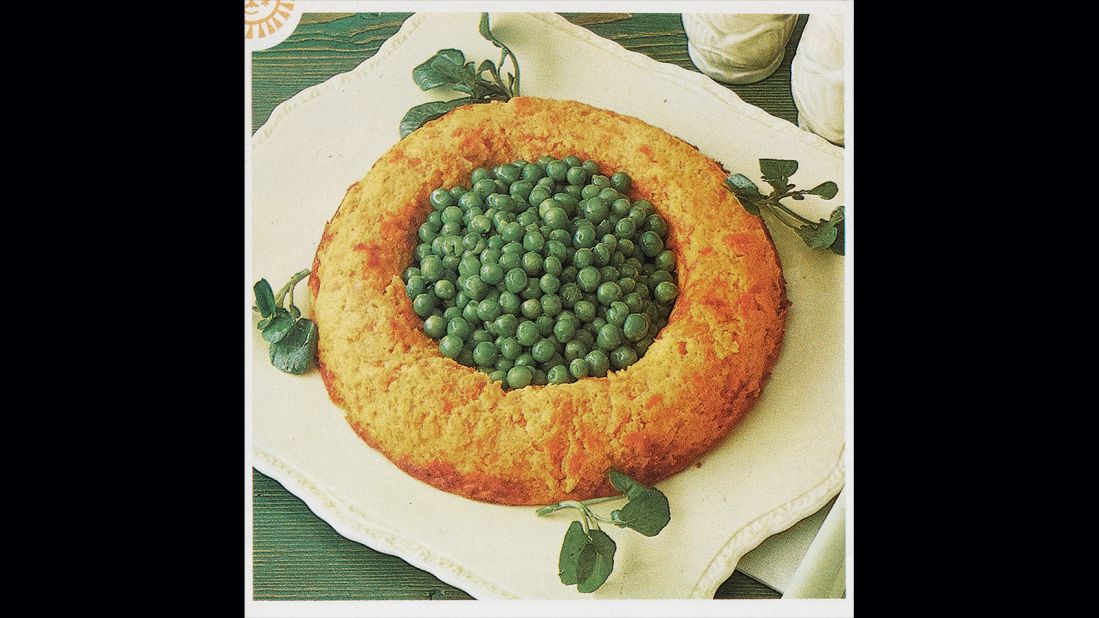 <strong>Carrot Ring with Peas --</strong> A lot of the dishes are a mix of the prosaic and the exotic. Here, elegant geometry elevates plain old carrots and peas. 