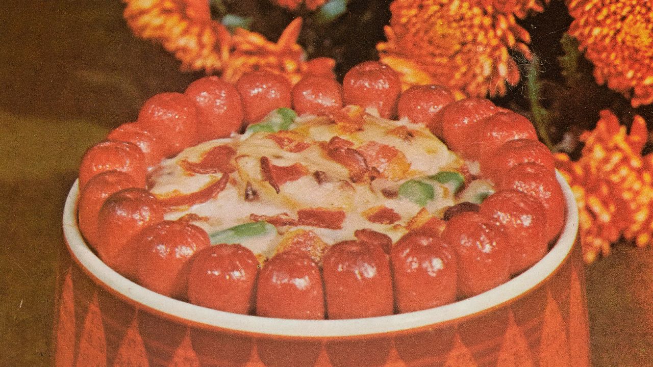 <strong>Frankfurter Crown -- </strong>Before there was Instagram, there were recipe cards. Author Anna Pallai revisits the glory days of food photography in her book "<a href="https://www.penguin.co.uk/books/1112320/70s-dinner-party/" target="_blank" target="_blank">70s Dinner Party: The Good, the Bad and the Downright Ugly of Retro Food</a>."