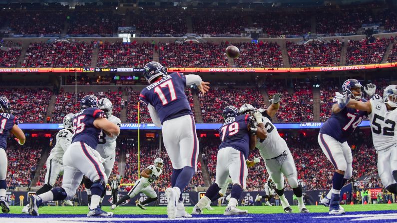 Houston quarterback Brock Osweiler throws from his own end zone during an NFL playoff game against Oakland on Saturday, January 7. The Texans won 27-14. It was their first playoff win since 2012.