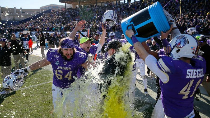 James Madison head coach Mike Houston is doused after the Dukes won the FCS championship game on Saturday, January 7. James Madison defeated Youngstown State 28-14 in Frisco, Texas.