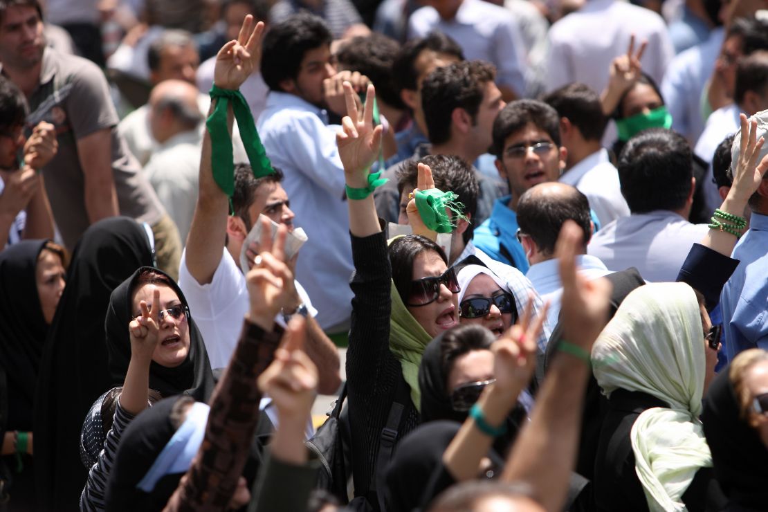 Iranian opposition supporters protest in Tehran after powerful cleric Akbar Hashemi Rafsanjani ended his Friday prayers sermon on July 17, 2009.