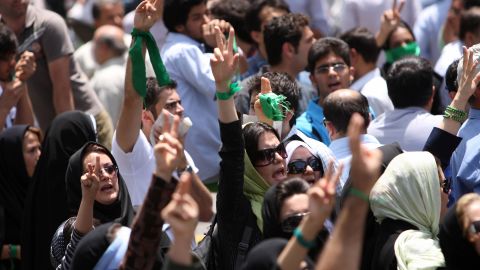 Iranian opposition supporters protest in Tehran after powerful cleric Akbar Hashemi Rafsanjani ended his Friday prayers sermon on July 17, 2009.